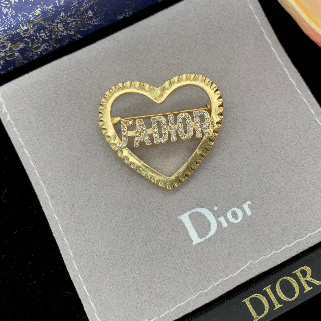 CD Brooch 178845
